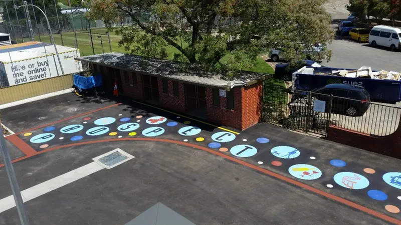 School entrance crossing decorated with colourful letter dots