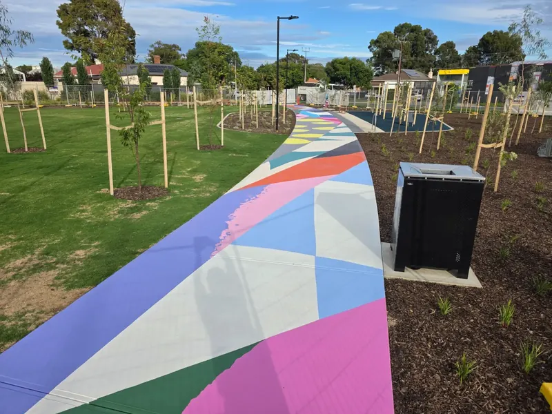 Geometric multicolour path winding through a new park