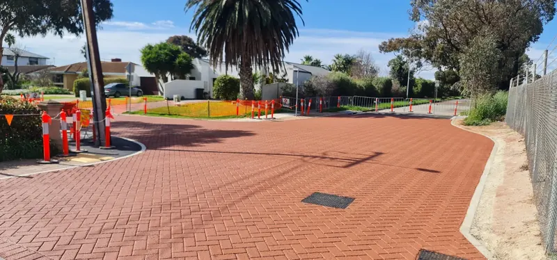 Red herringbone StreetPrint stamped asphalt plaza
