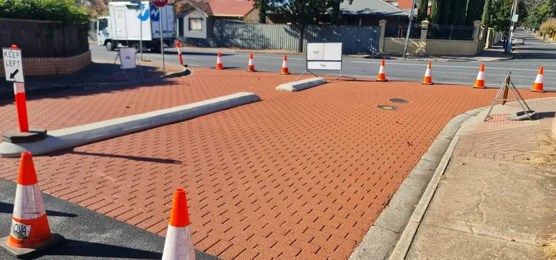 Terracotta brick StreetPrint roadway in a suburban street