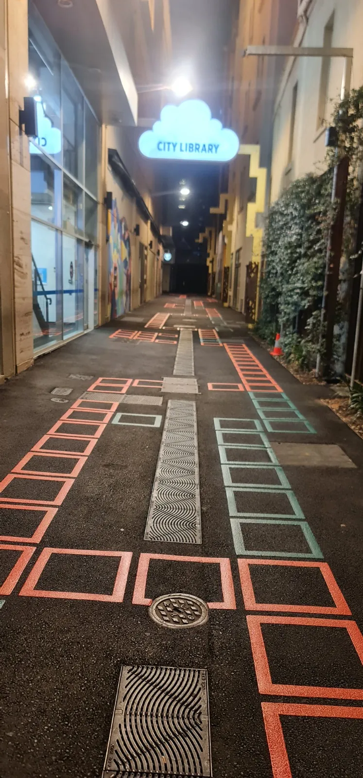 Coral ladder pattern brightening a retail laneway